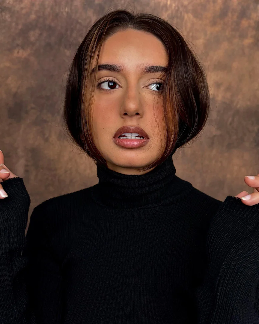 Headshot em preto e branco de Paola Naman